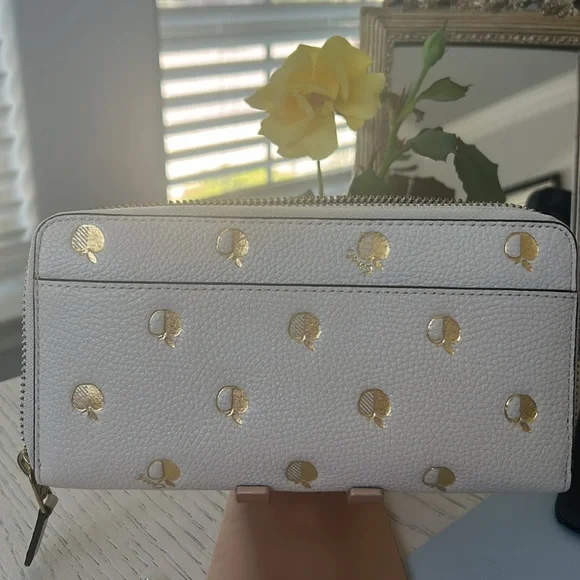 COACH- Accordion Zip Wallet with Apple Print in Gold. - Picture 2 of 6